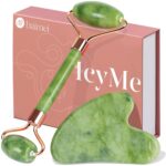 A BAIMEI IcyMe green jade roller and a matching green jade gua sha tool displayed together in an elegant box.