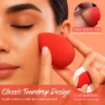 Five multi-colored BEAKEY makeup sponges in a teardrop shape, posed on a clean surface, ready for makeup application.