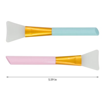 A pink and a blue silicone face mask applicator wand, side by side, showcasing their flexible bristles and ergonomic handles.