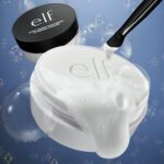 e.l.f. Clean Queen Solid Brush & Sponge Cleaner in its case with a silicone pad, shown next to a wet makeup brush.