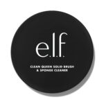 e.l.f. Clean Queen Solid Brush & Sponge Cleaner in its case with a silicone pad, shown next to a wet makeup brush.