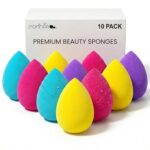 A set of 10 mixed-color, teardrop-shaped Earth & I latex-free makeup sponges, some dry and some wet and expanded.