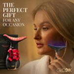 Black GLO24K LED Face Massager and Neck Wand, an anti-aging beauty tool with three LED lights.