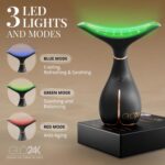 Black GLO24K LED Face Massager and Neck Wand, an anti-aging beauty tool with three LED lights.
