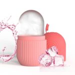 Close-up of the pink striped Joyeee silicone ice facial roller, ready for use on skin.