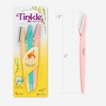 Close-up of Tinkle Women's Dermaplaning Razors, showing the single blade and ergonomic handle in a 36-count box.