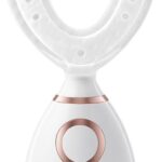 White upLift 5 Nano-Pulse anti-aging device with mouthpiece and power cord on a clean background.