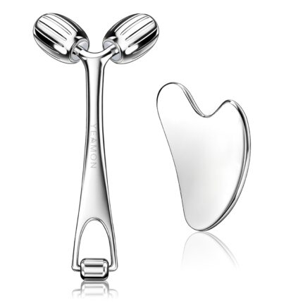 Silver Yeamon stainless steel dual-head facial roller and a matching gua sha tool on a clean surface.